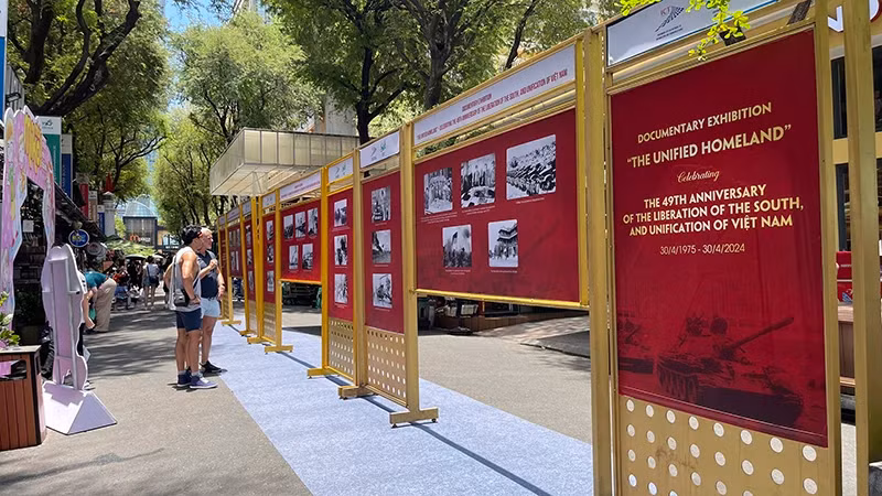 Foreign tourists visit the exhibition at Book Street in Ho Chi Minh City.