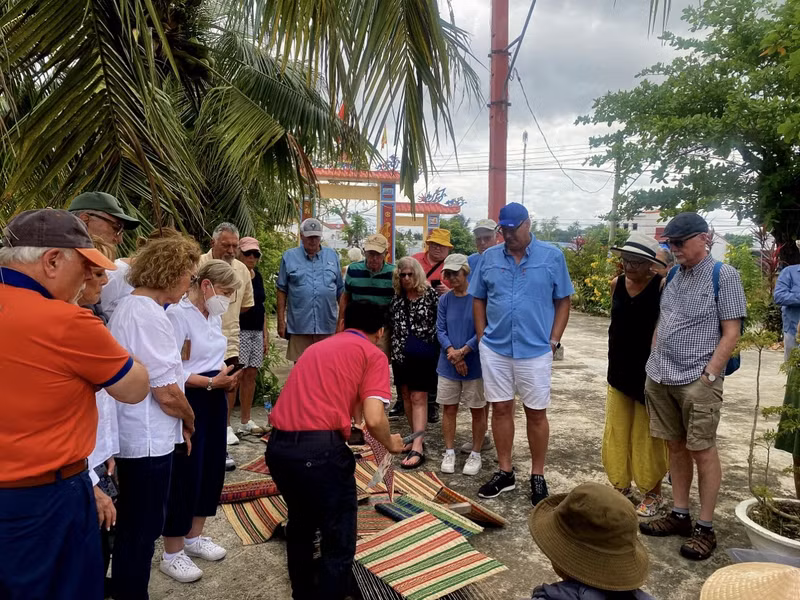 Holidaymakers, who are on a tour of the Silver Muse cruise ship, visit a traditional craft village on the outskirts of Nha Trang city. (Photo: VNA)