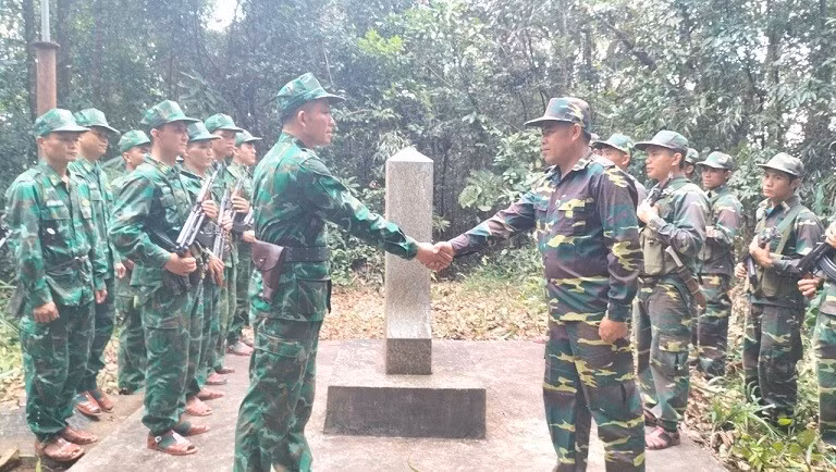 Vietnam and Laos border guards inspect the situation of Marker No. 455