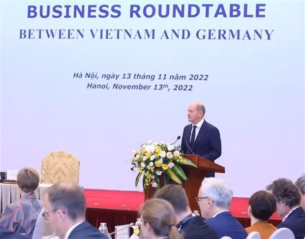 German Chancellor Olaf Scholz speaks at the business roundtable in Hanoi on November 13. (Photo: VNA)