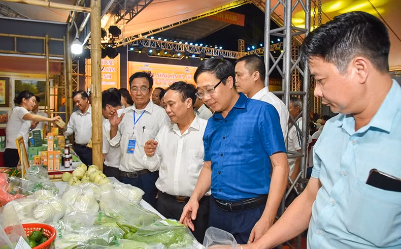 Delegates visit the booth at the festival.