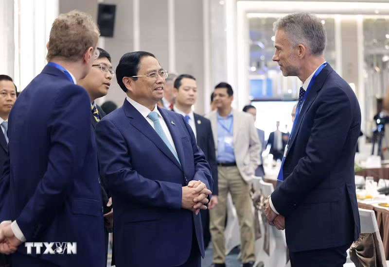 Prime Minister Pham Minh Chinh and delegates at the event (Photo: VNA)