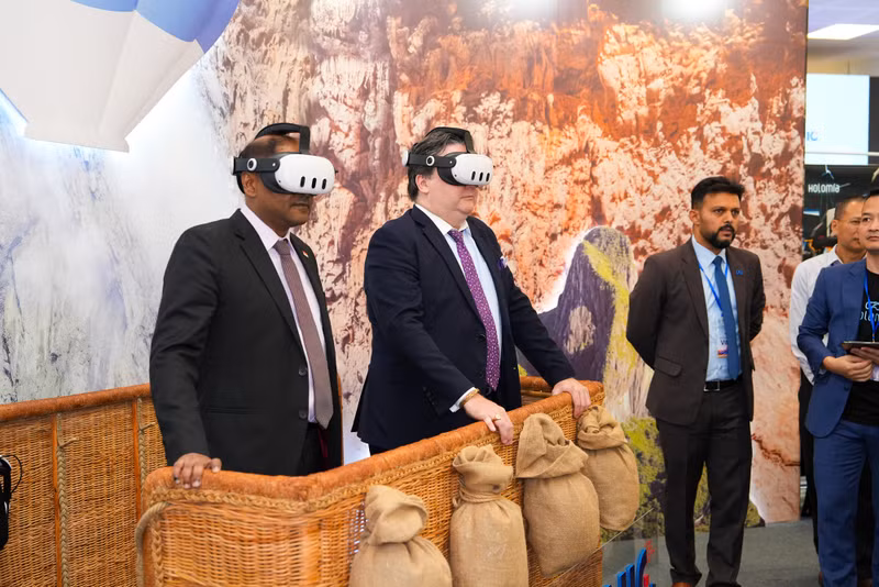 Visitors enjoy a VR (Virtual Reality) tour exploring Son Doong Cave - the largest natural cave in the world.