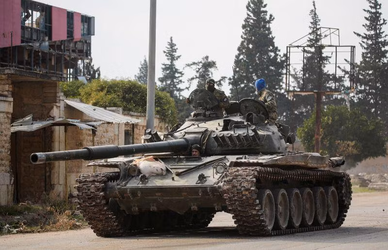 Rebels led by the Islamist militant group Hayat Tahrir al-Sham drive a military vehicle in al-Rashideen, Aleppo Province, Syria November 29, 2024. (Photo: REUTERS)