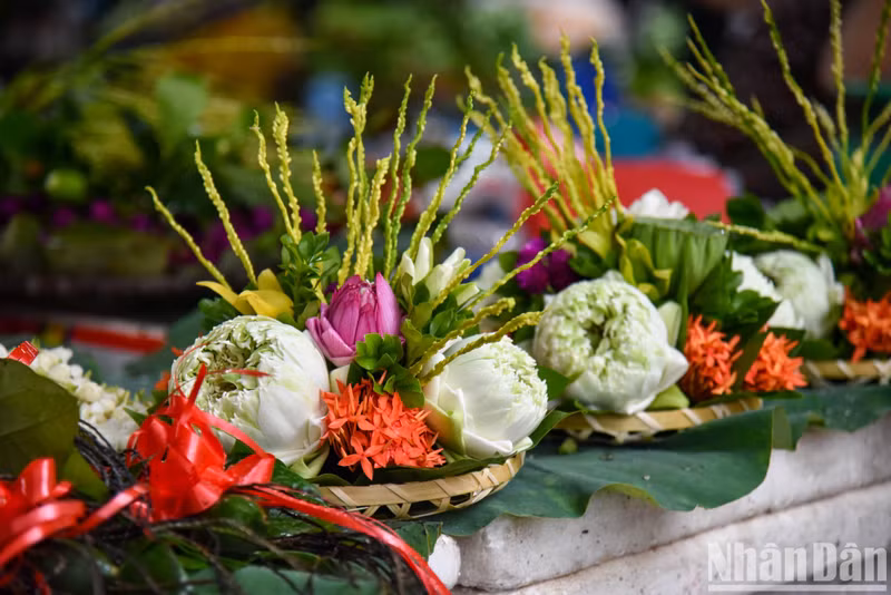 Trays of flower arrangements are also among the most sold items at the market.