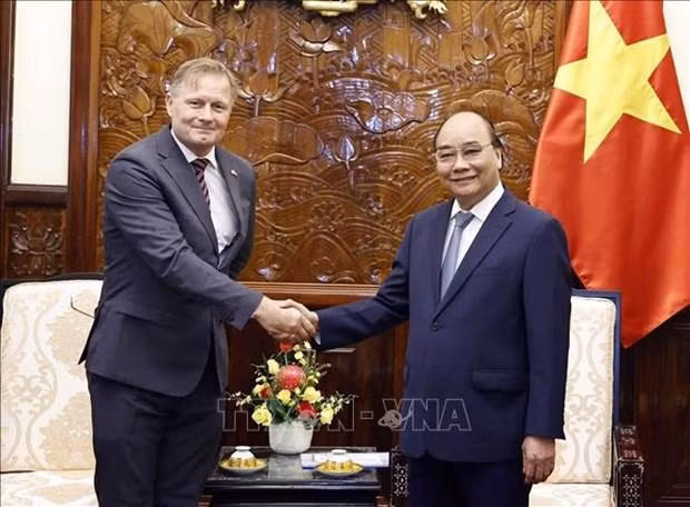 Danish Ambassador Nicolai Prytz (L) (Photo: VNA)