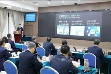 The Vietnamese delegation learn about the smart court model (using AI to support trials) at the Shenzhen Intermediate People's Court (SIPC), Guangdong province, China (Photo: VNA) 