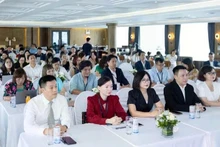Delegates attend the seminar.