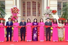 Delegates at the opening ceremony of the exhibition "Celebrating the Party, the Spring, and the Success of the 14th National Party Congress". (Photo: VNA)
