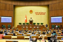 National Assembly deputies votes on the revised Law on Planning on December 10. (Photo: VNA)
