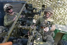 Ukrainian soldiers operate weapons in Kupyansk district, Ukraine. (Photo: Xinhua)