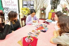 A needlework practice session within the “Threads of Time” project.