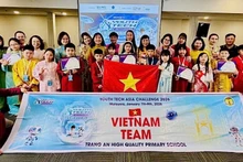 The Trang An High-Quality Primary School delegation celebrates its remarkable achievements at the final round of the Youth Tech Asia Challenge.
