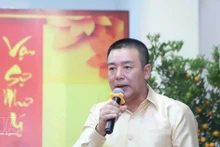 Defence Attaché of Viet Nam to Laos Colonel Phan Huu Thang speaks at the event. (Photo: VNA)