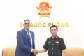Deputy Prime Minister and Minister of National Defence General Phan Van Giang (R) receives Swedish Ambassador Johan Ndisi (Photo: baochinhphu.vn)