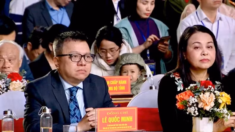 Delegates attend the opening ceremony.