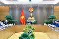 Prime Minister Le Minh Hung on August 28 holds phone talks with German Chancellor Friedrich Merz. (Photo: NDO)