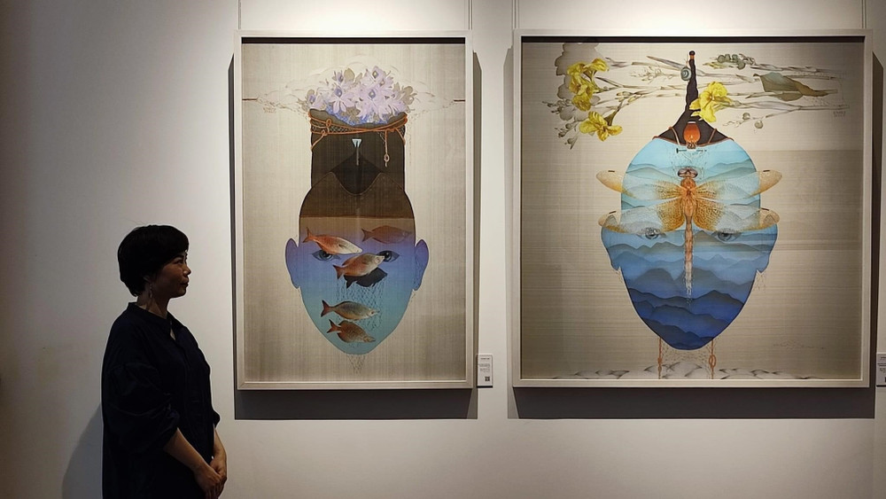 Exhibition of silk paintings gathers five famous Vietnamese painters | Nhan  Dan Online