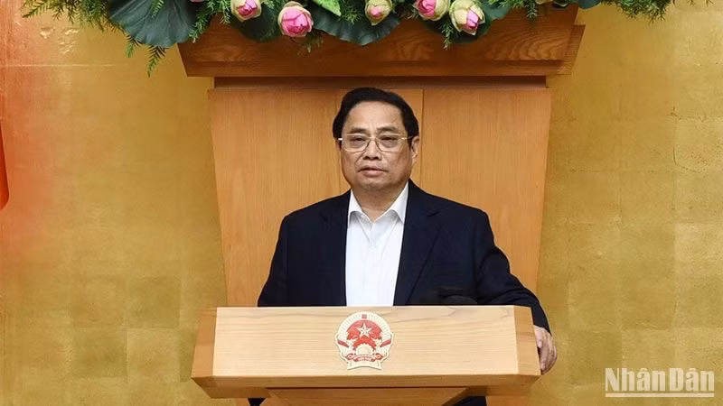 Prime Minister Pham Minh Chinh speaks at the meeting. (Photo: VNA)