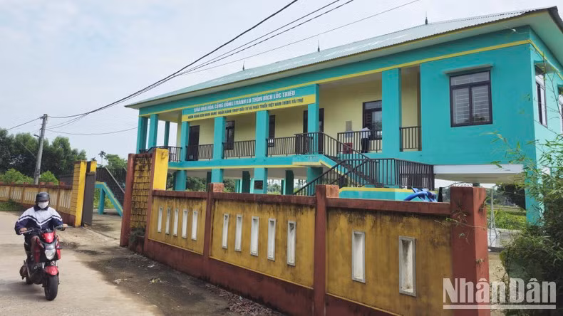 The people of Bich Loc Trieu Village are filled with joy at the construction of a flood-proof house.