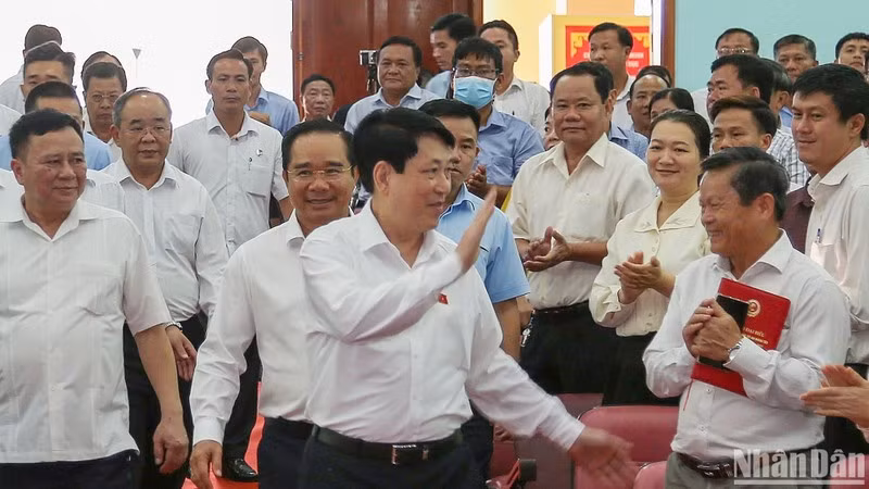 President Luong Cuong waves at voters in Cu Chi.