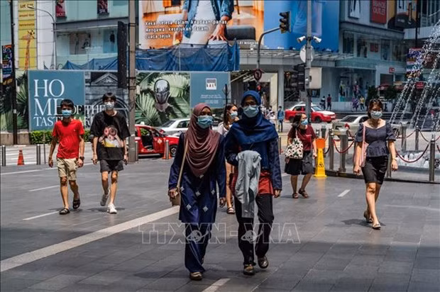 Malaysia plans to relax rules on hiring foreign workers as the country's industries have been facing labour shortage. (Photo: AFP/VNA)