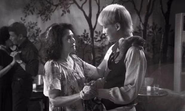 Actress Minh Chau (L) in the movie "Cu Li never cries" by director Pham Ngoc Lan.