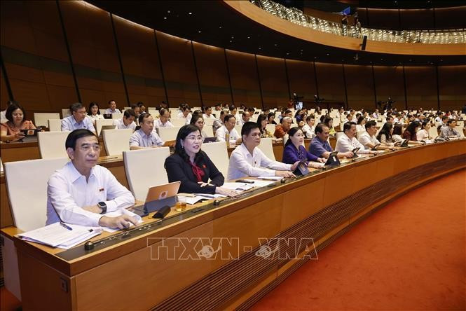 Deputies at the 7th session of the 15th NA (Photo: VNA) 