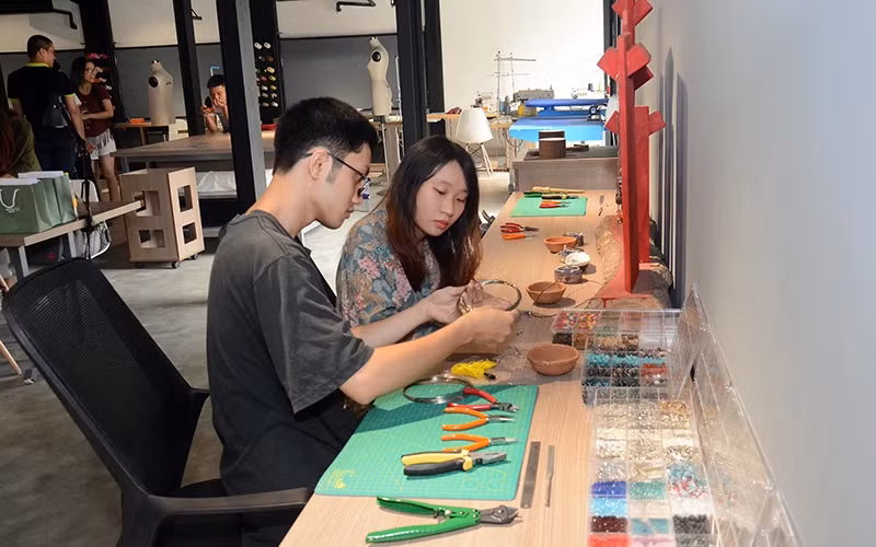 Young people working at UPGen Creative Space in Luong Yen, Hanoi. (Photo: DANG ANH)