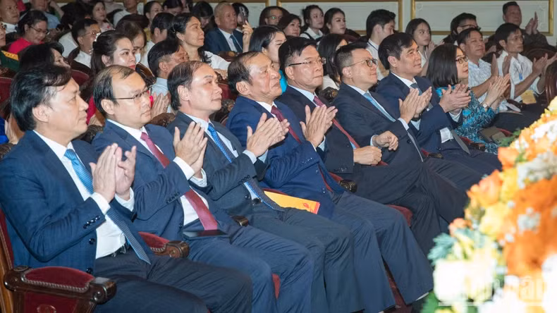 Delegates attend the awards ceremony.