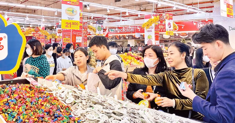 People shopping at a supermarket in Hanoi.
