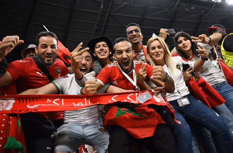 Morocco fans celebrate after the penalty shootout as Morocco progress to the quarter finals. (Photo: REUTERS)