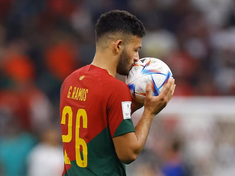 Portugal's Goncalo Ramos kisses the ball after the match after scoring a hat-trick. (Photo: REUTERS)
