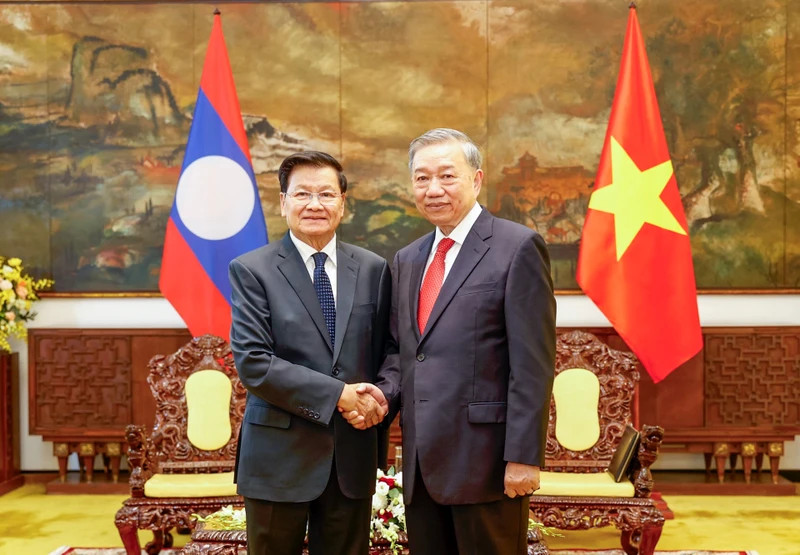 General Secretary of the Communist Party of Vietnam (CPV) Central Committee To Lam (R) receives General Secretary of the Lao People’s Revolutionary Party (LPRP) and President of Laos Thongloun Sisoulith in Ho Chi Minh City on April 29 (Photo: NDO) 