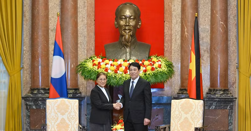 President Luong Cuong and Lao Vice President Pany Yathotou.