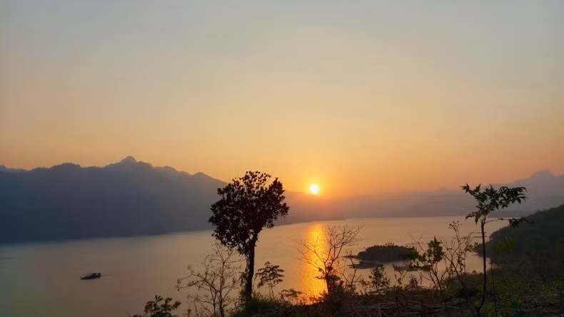 Dreamy sunset by the lake.