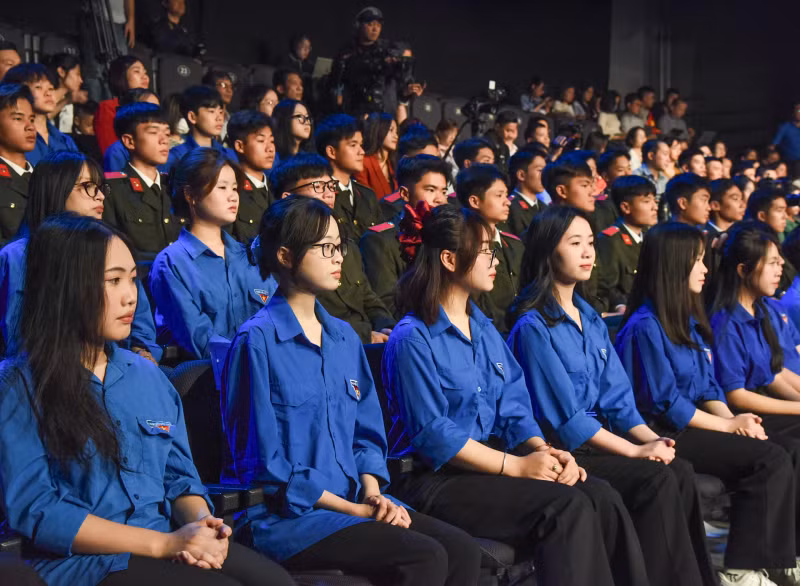 Youth union members attend the ceremony.