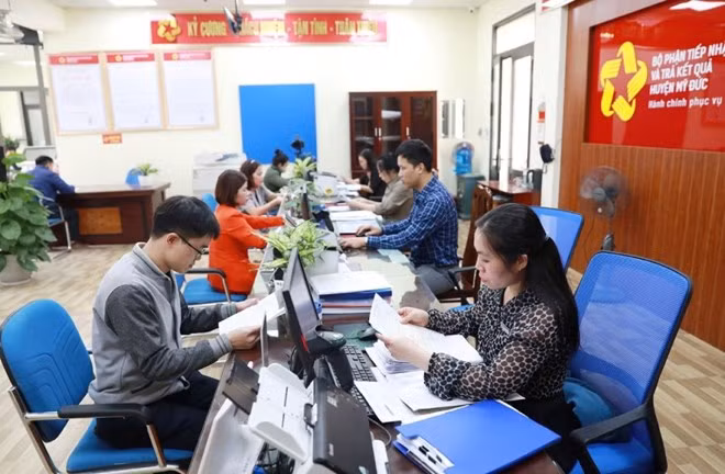 The Government issues Resolution No. 74/NQ-CP on a plan to implement the arrangement of administrative units and building a two-tier local government model - Illustrative image (Photo: laodong.vn)