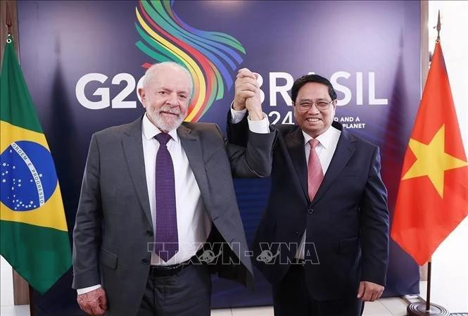 Prime Minister Pham Minh Chinh (R) and Brazilian President Lula da Silva at their talks in November 2024. (Photo: VNA)