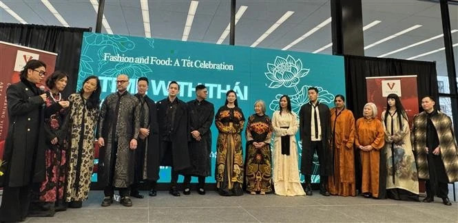 Designer Thai Nguyen's Ao dai collection at the event (Photo: VNA) 