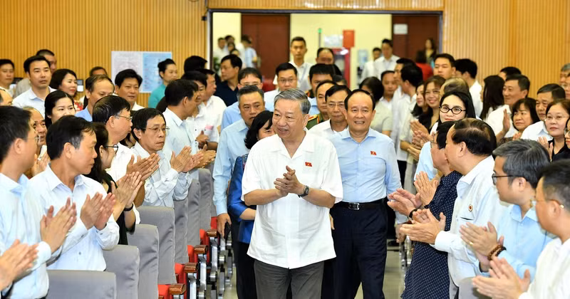 Party General Secretary To Lam and NA deputies attend the meeting with voters in Hanoi.