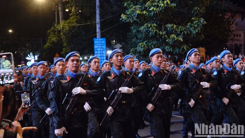 Many people capture memorable moments of the parade and procession.