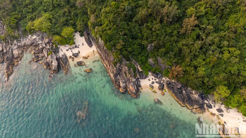 Magnificent rock formations surround the island as seen from above.