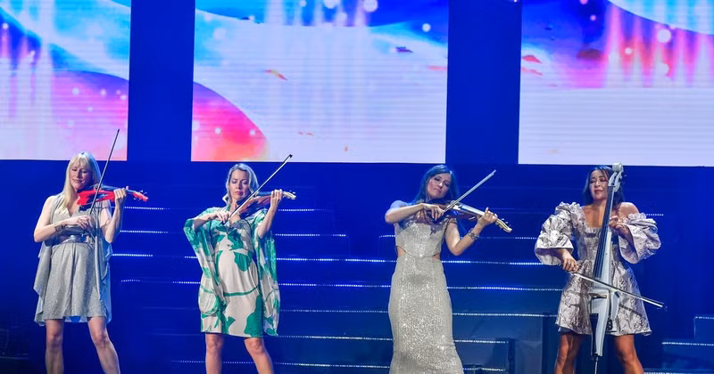 The Bond Quartet delivers an emotionally charged performance at the "Bond Live in Vietnam" concert. (Photo: THANH DAT)