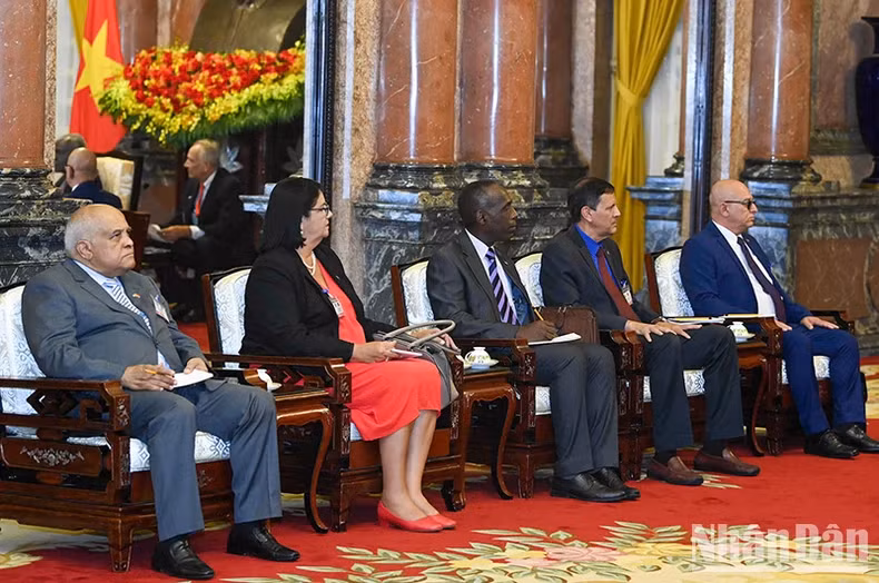 Cuban delegates attend the reception.
