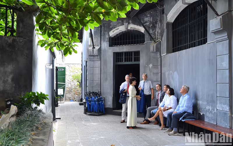 President of the Belgian Senate Stephanie D'Hose and members of the delegation listen to explanations and introductions about Hoa Lo Prison Relic Site.