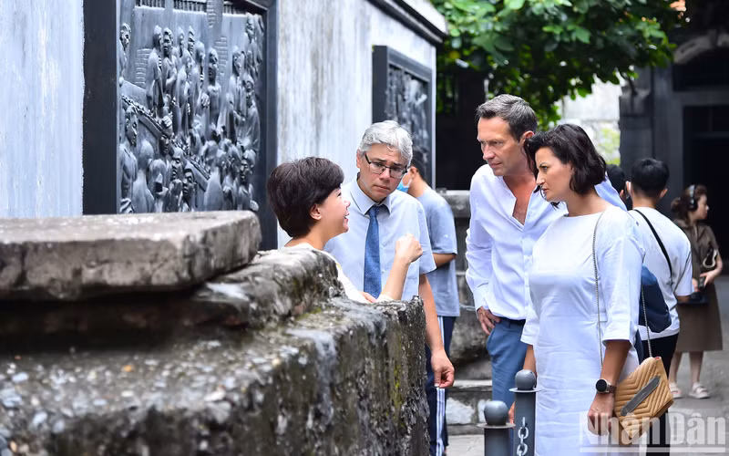 President of the Belgian Senate Stephanie D'Hose listens to stories about past successful prison escapes of death row prisoners or revolutionary and political theory propaganda sessions, at the prison.