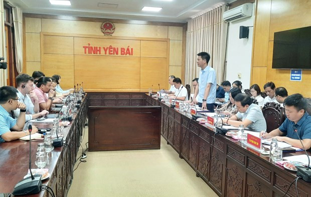 At the working session (Photo: VNA)