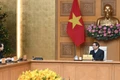 Prime Minister Pham Minh Chinh receives Chinese Ambassador to Viet Nam He Wei (Photo: Tran Hai)