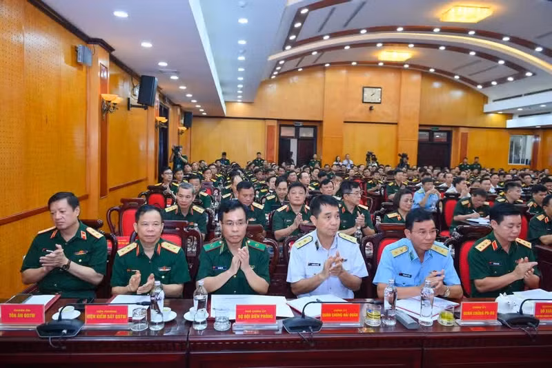 Delegates attend the conference.